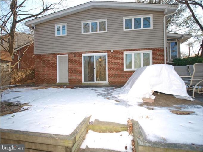 711 North Belgrade Road Silver Spring, MD 20902 - Photo 9 of 25 a view of a house with a snow