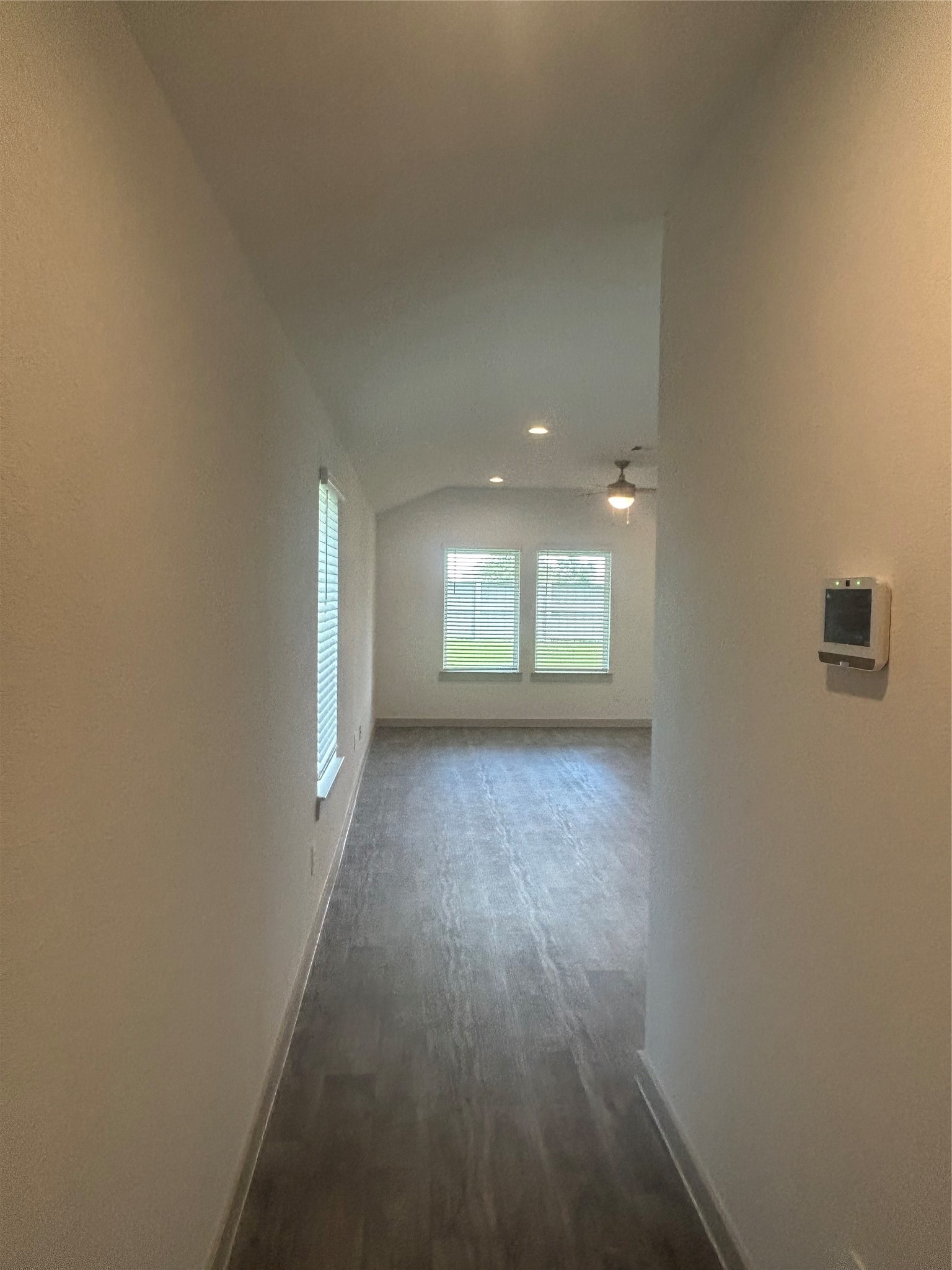 215 Dusty Bridle Lane Rosharon, TX 77583 - Photo 3 of 15 a view of a room that has wooden floor and window
