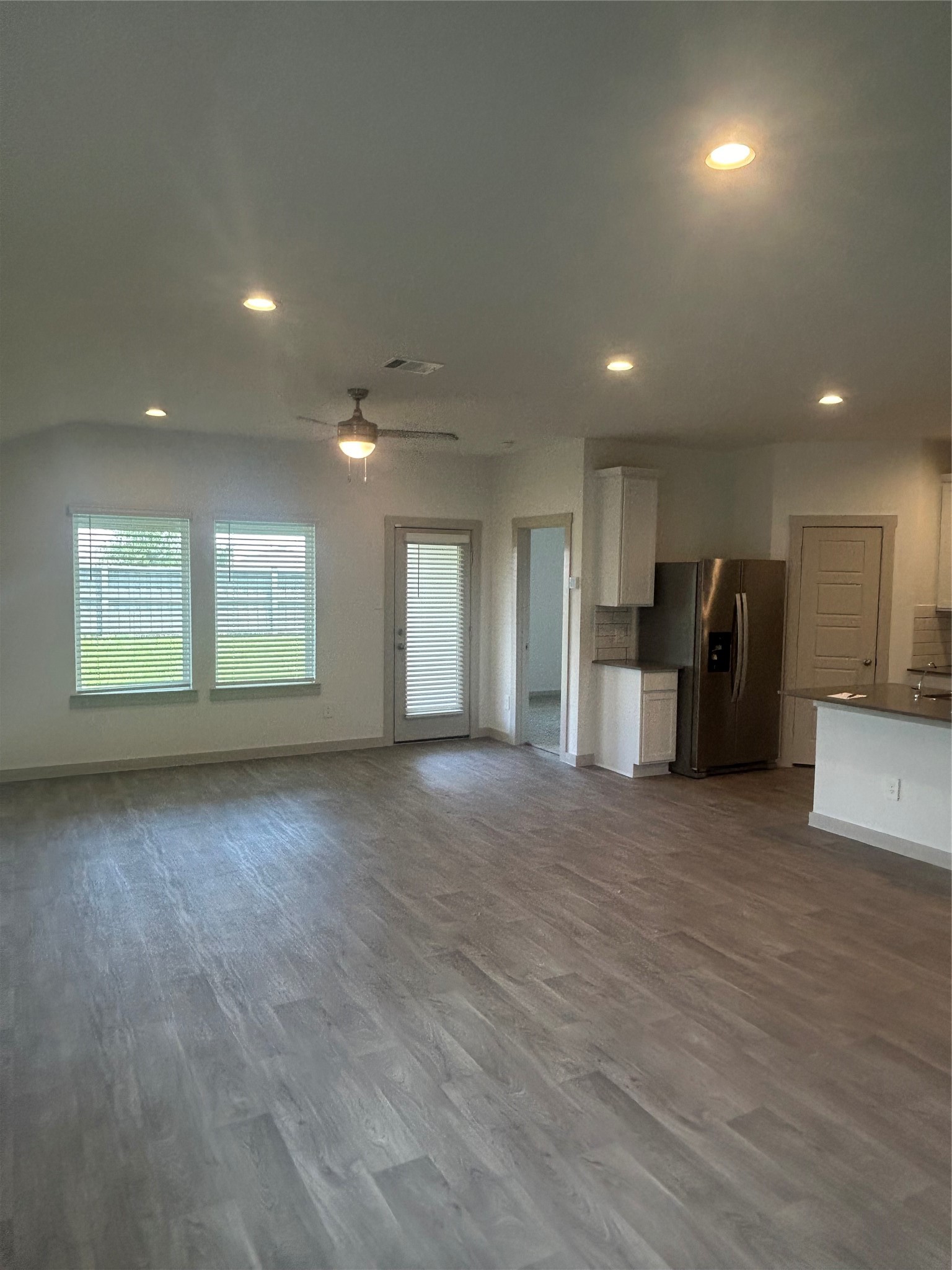 215 Dusty Bridle Lane Rosharon, TX 77583 - Photo 4 of 15 a view of a big room with windows and closet