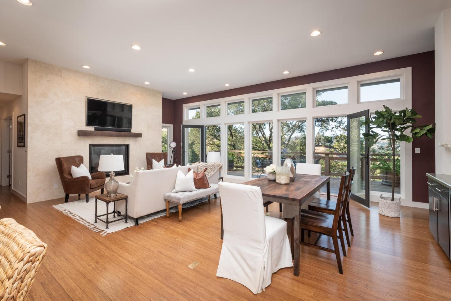 672 Moraga Road Lafayette, CA 94549 - Photo 13 of 43 a living room with fireplace furniture and a flat screen tv