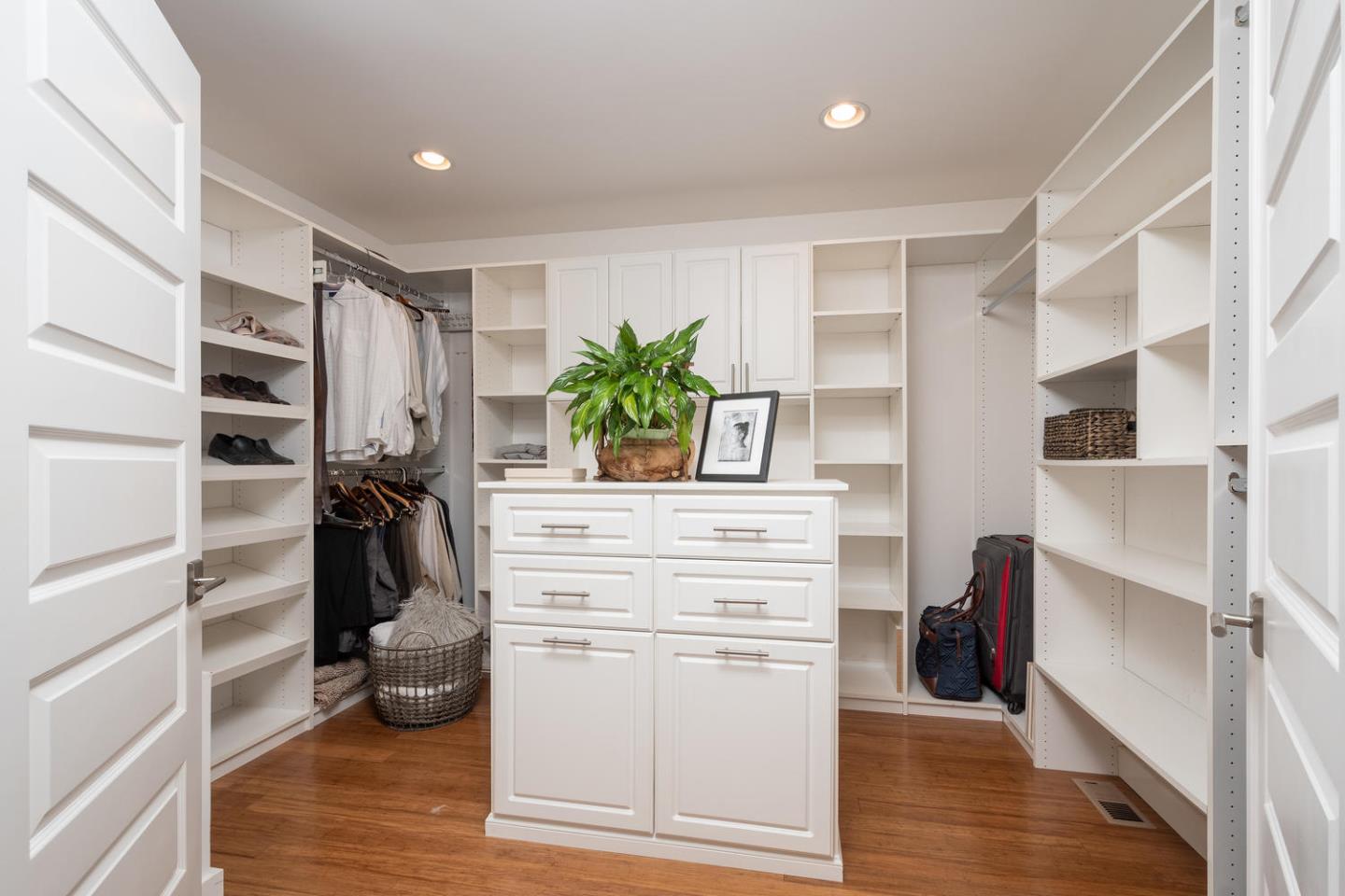 672 Moraga Road Lafayette, CA 94549 - Photo 20 of 43 a kitchen with white cabinets and appliances