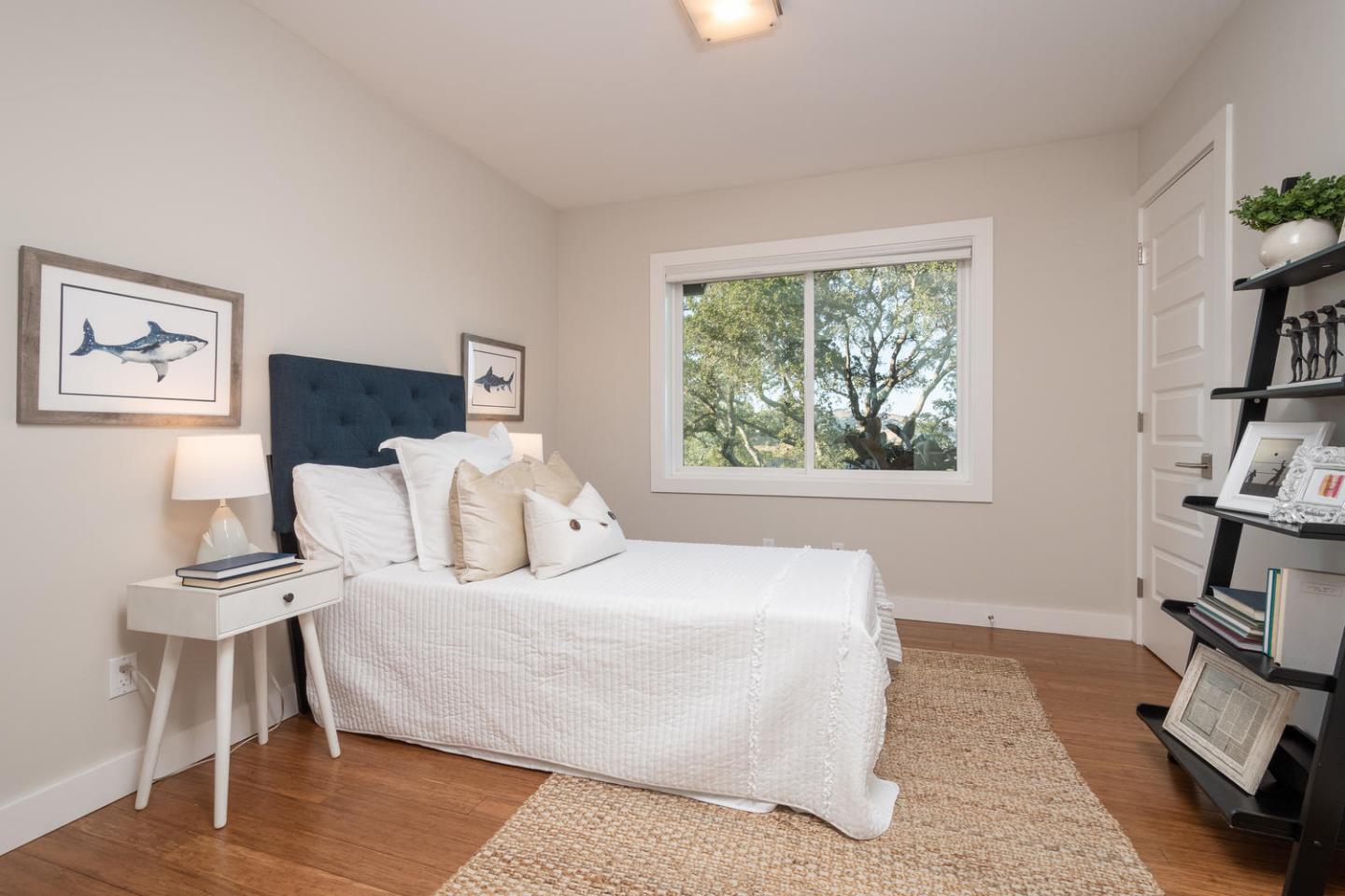 672 Moraga Road Lafayette, CA 94549 - Photo 22 of 43 a bedroom with a bed and a large window