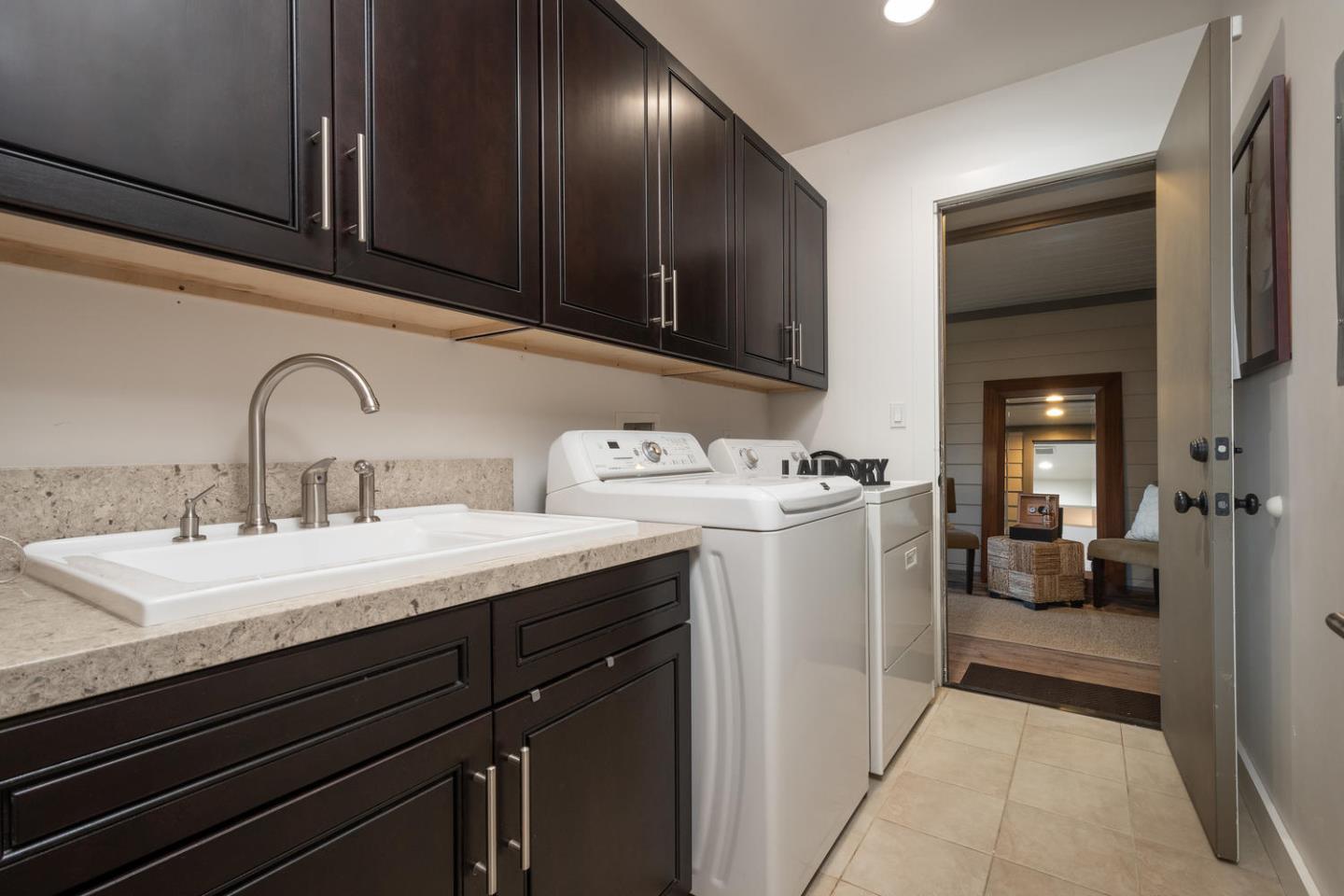 672 Moraga Road Lafayette, CA 94549 - Photo 25 of 43 a utility room with sink dryer and washer
