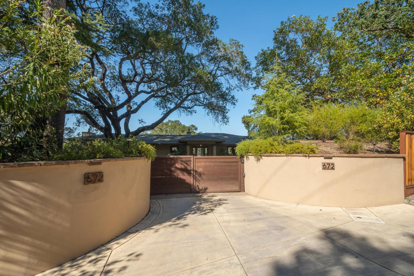 672 Moraga Road Lafayette, CA 94549 - Photo 4 of 43 a view of a house with a yard