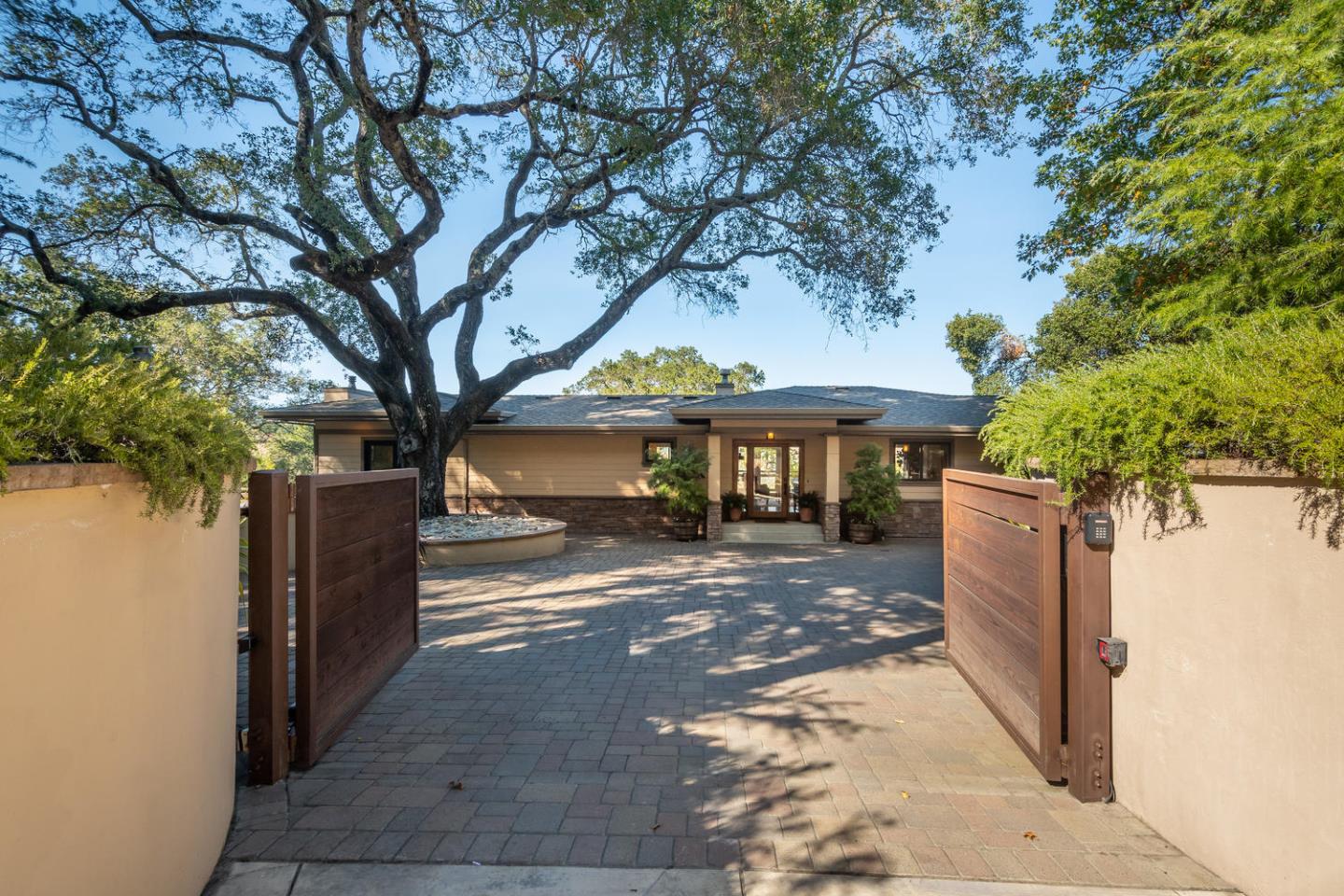 672 Moraga Road Lafayette, CA 94549 - Photo 5 of 43 a view of a large trees with wooden fence