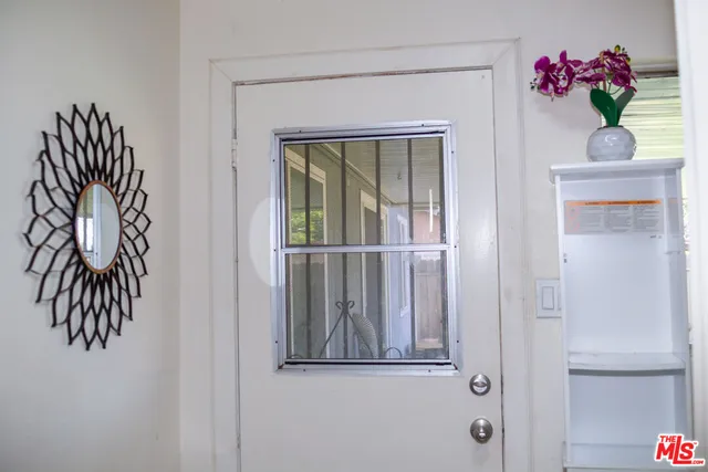 a view of a hallway to a house
