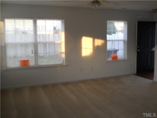 5510 Golden Moss Trail Raleigh, NC 27613 - Photo 4 of 16 Carpeted Family room with plenty of light. Ceiling Fan, Blinds,Wood Foyer. Den/Family/Great Room