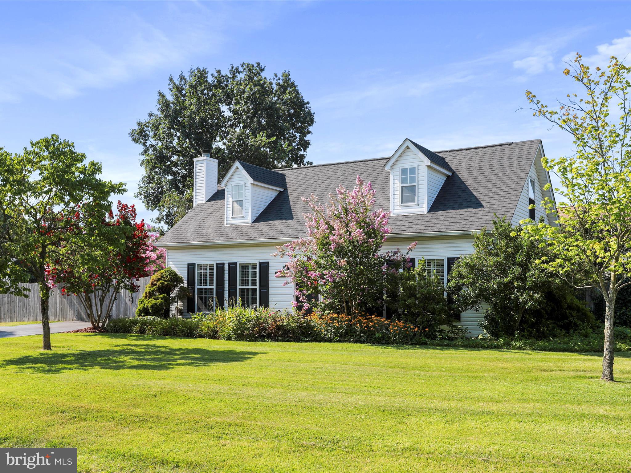100 Lloyds Road Winchester, VA 22602 - Photo 1 of 39 a front view of a house with a garden