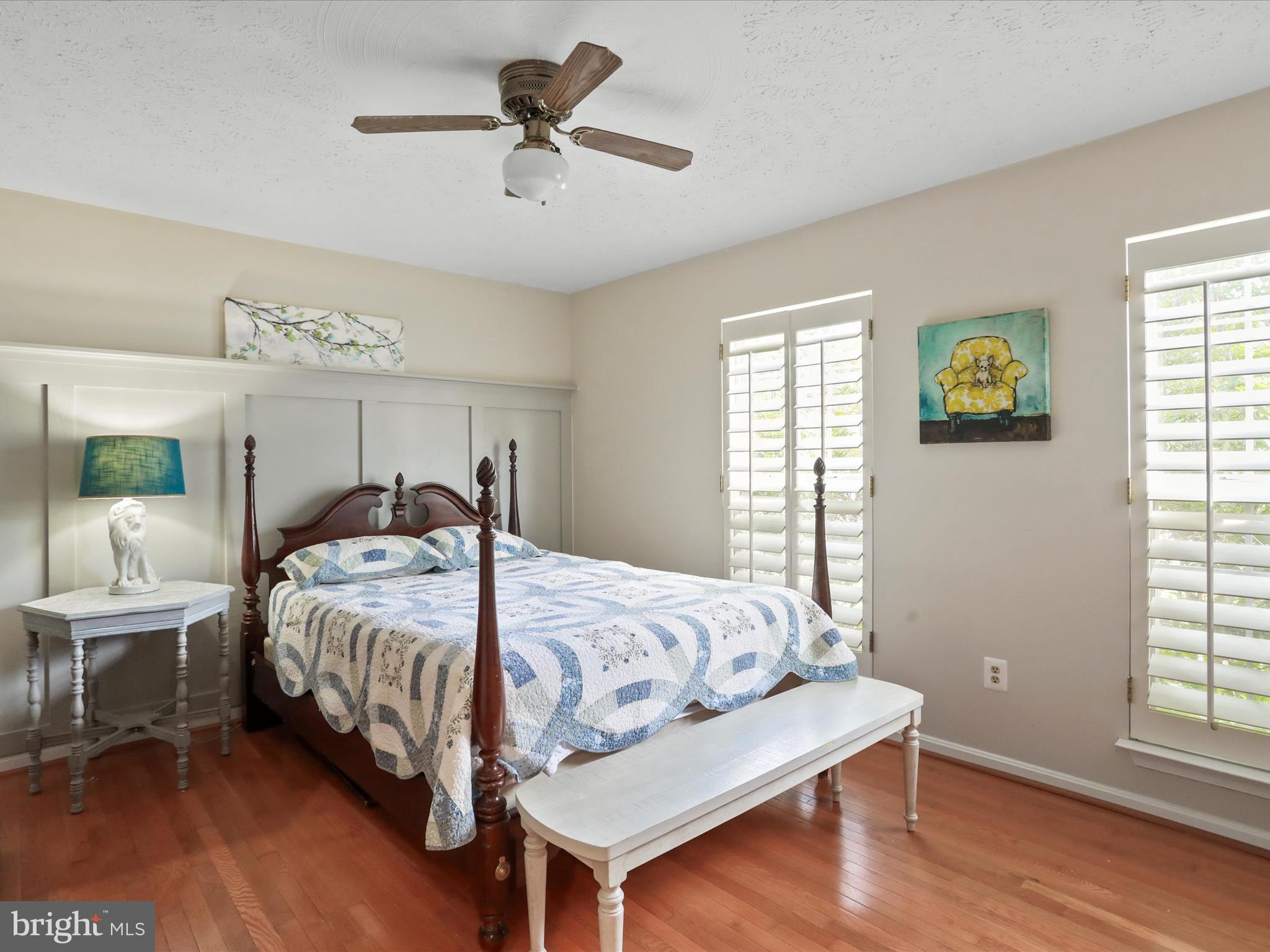 100 Lloyds Road Winchester, VA 22602 - Photo 17 of 39 a bedroom with a bed a window and a chandelier