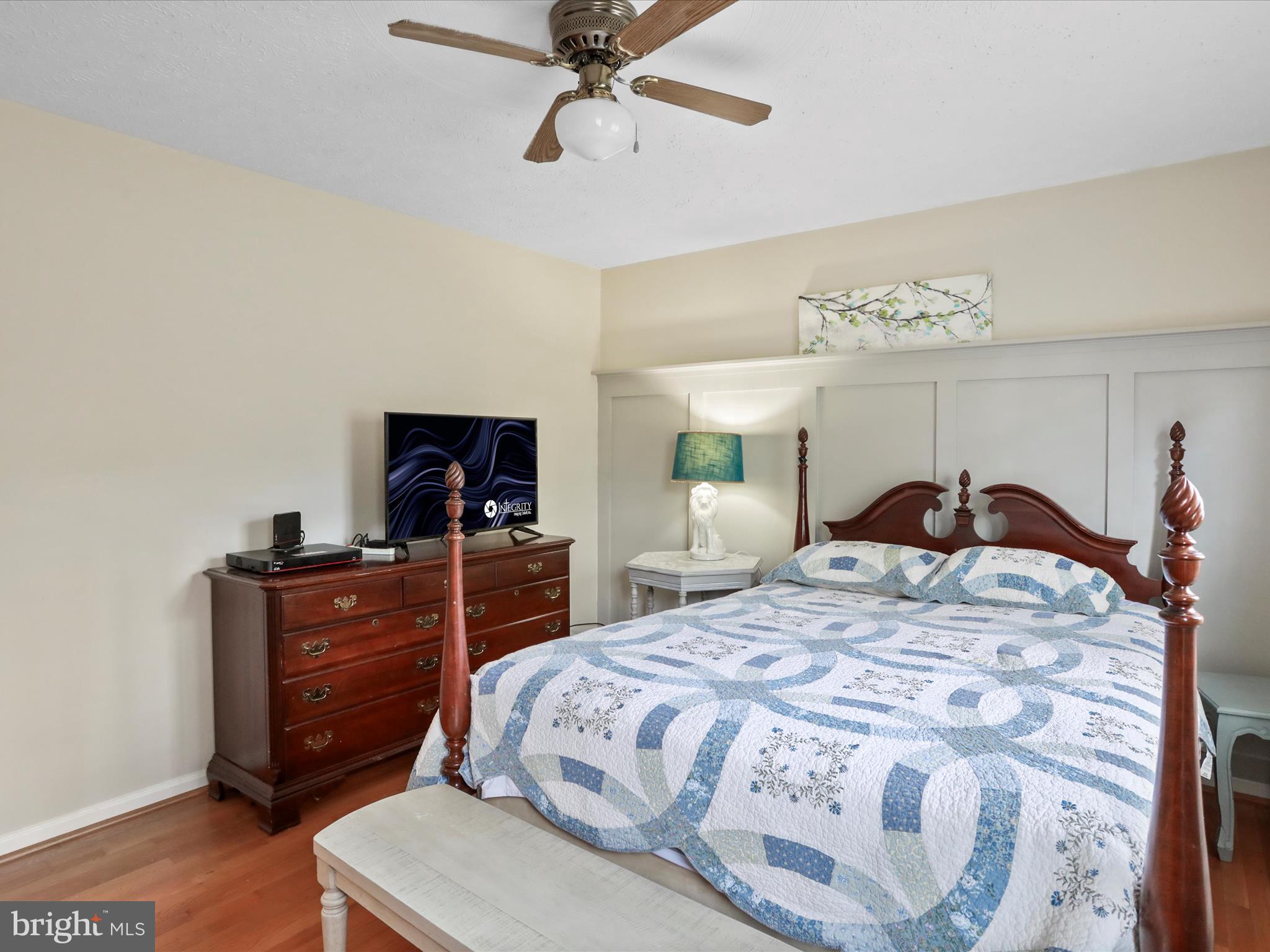 100 Lloyds Road Winchester, VA 22602 - Photo 18 of 39 a bedroom with a bed and a flat screen tv