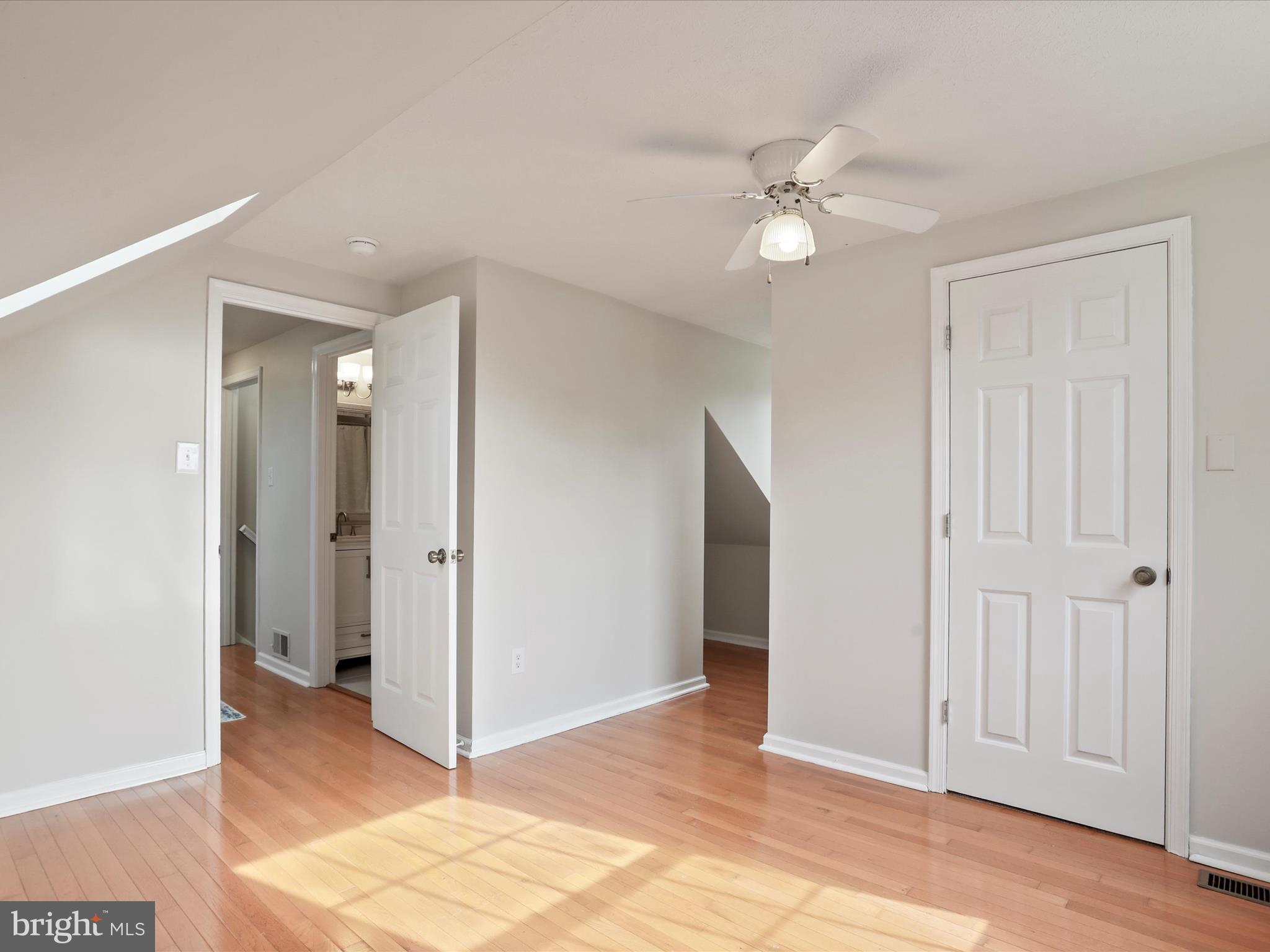 100 Lloyds Road Winchester, VA 22602 - Photo 24 of 39 a view of a livingroom with a ceiling fan and entryway