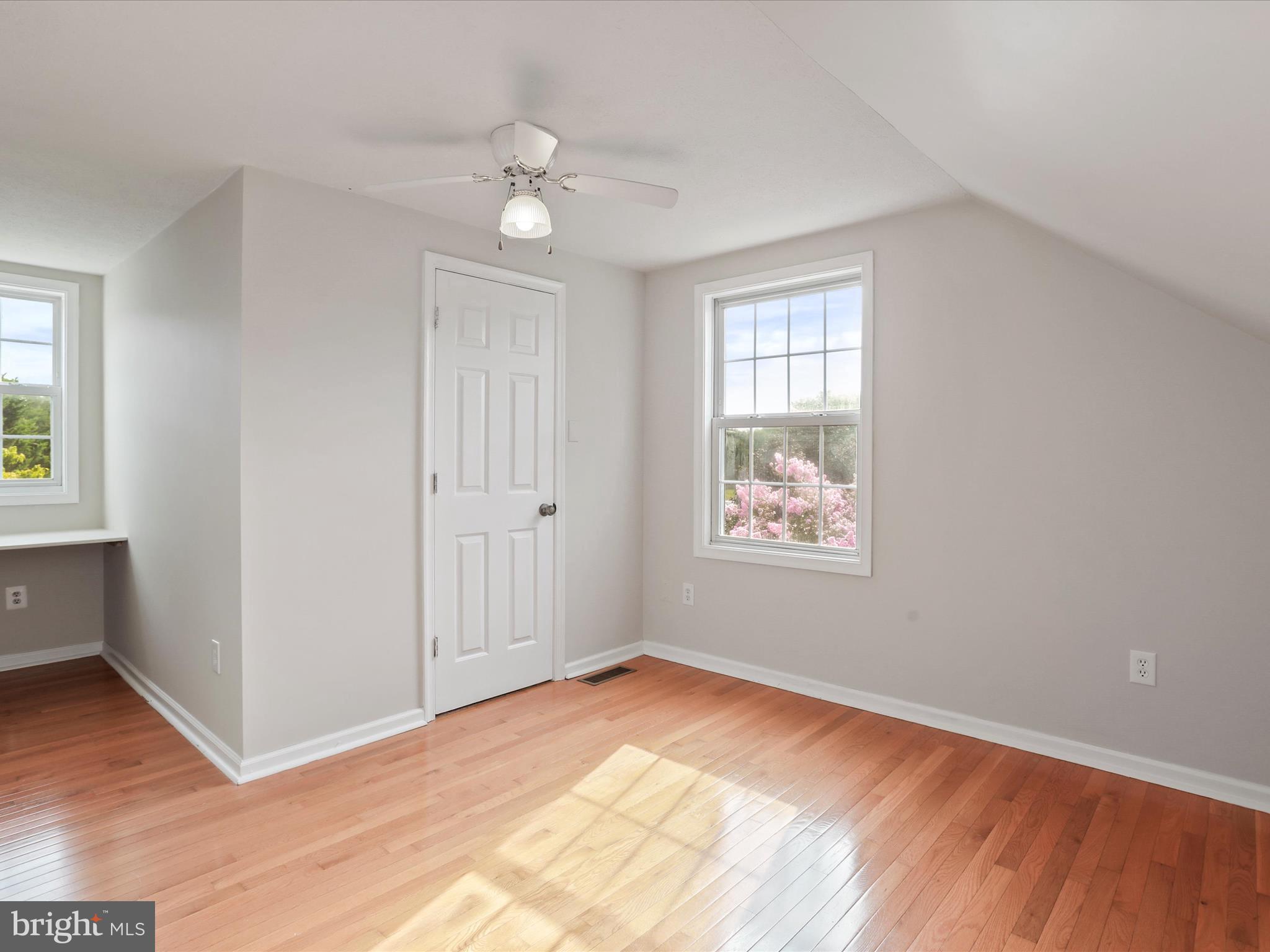 100 Lloyds Road Winchester, VA 22602 - Photo 25 of 39 an empty room with wooden floor and windows