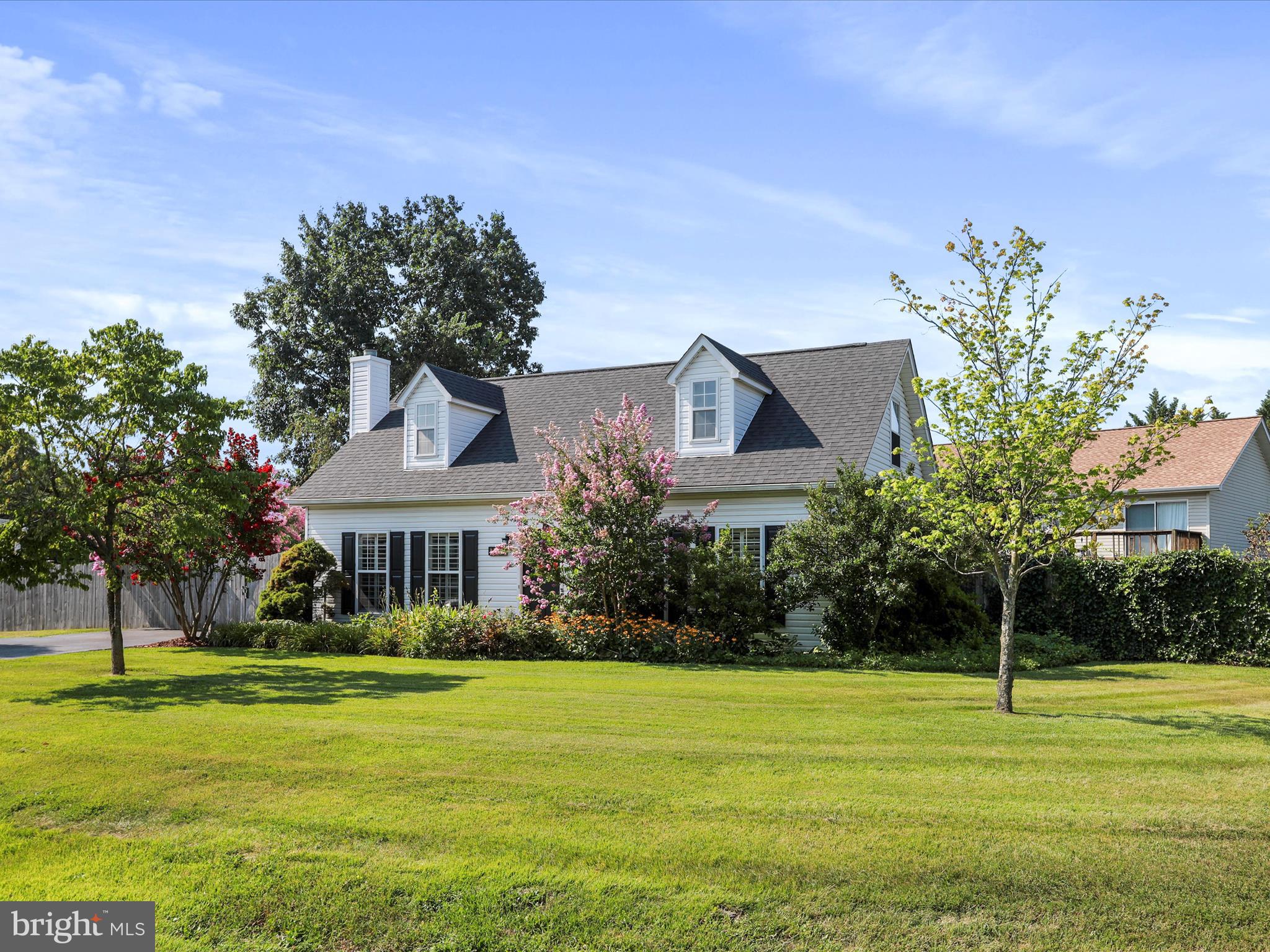 100 Lloyds Road Winchester, VA 22602 - Photo 3 of 39 a front view of a house with a yard