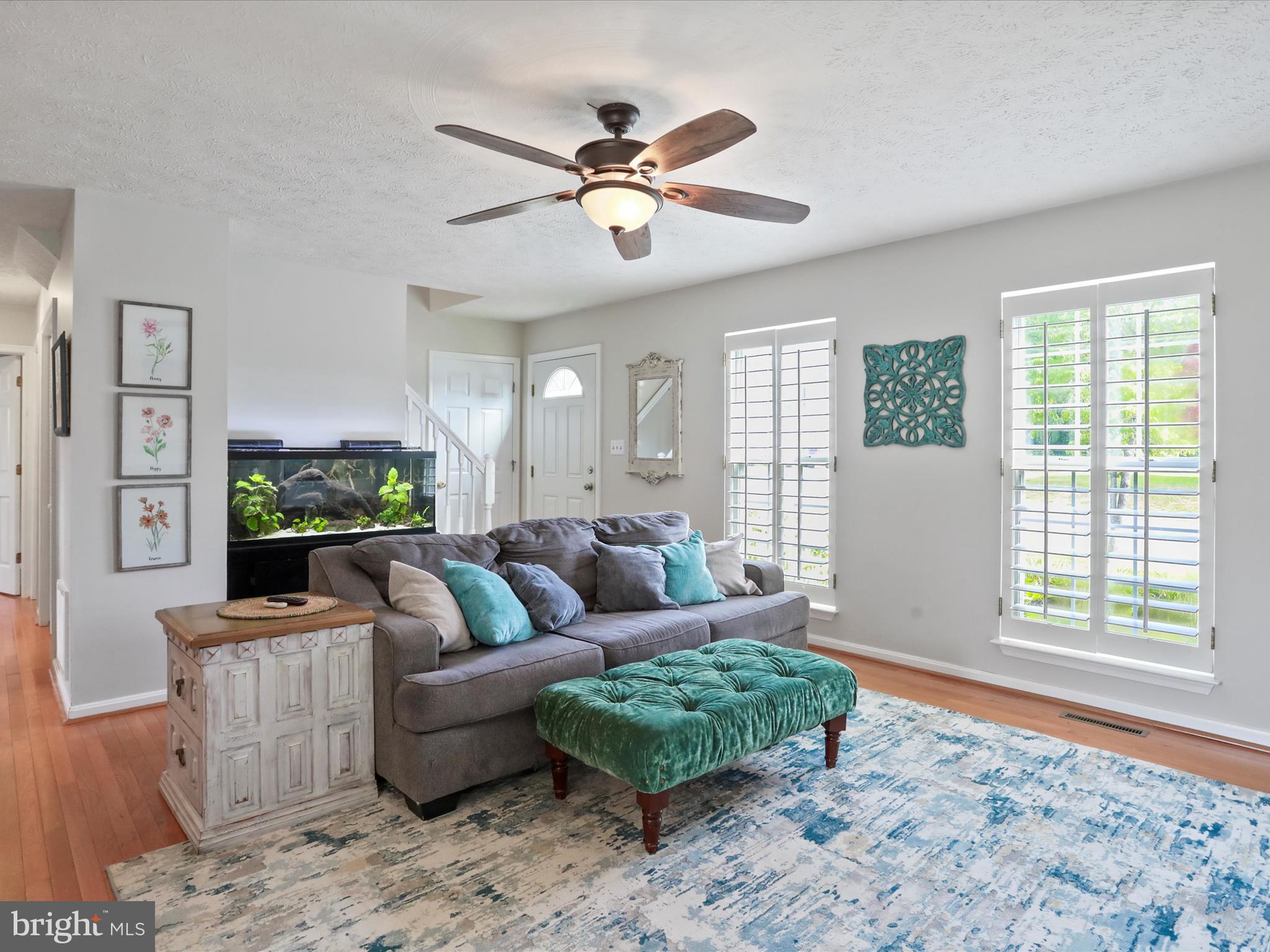 100 Lloyds Road Winchester, VA 22602 - Photo 5 of 39 a living room with furniture and a large window