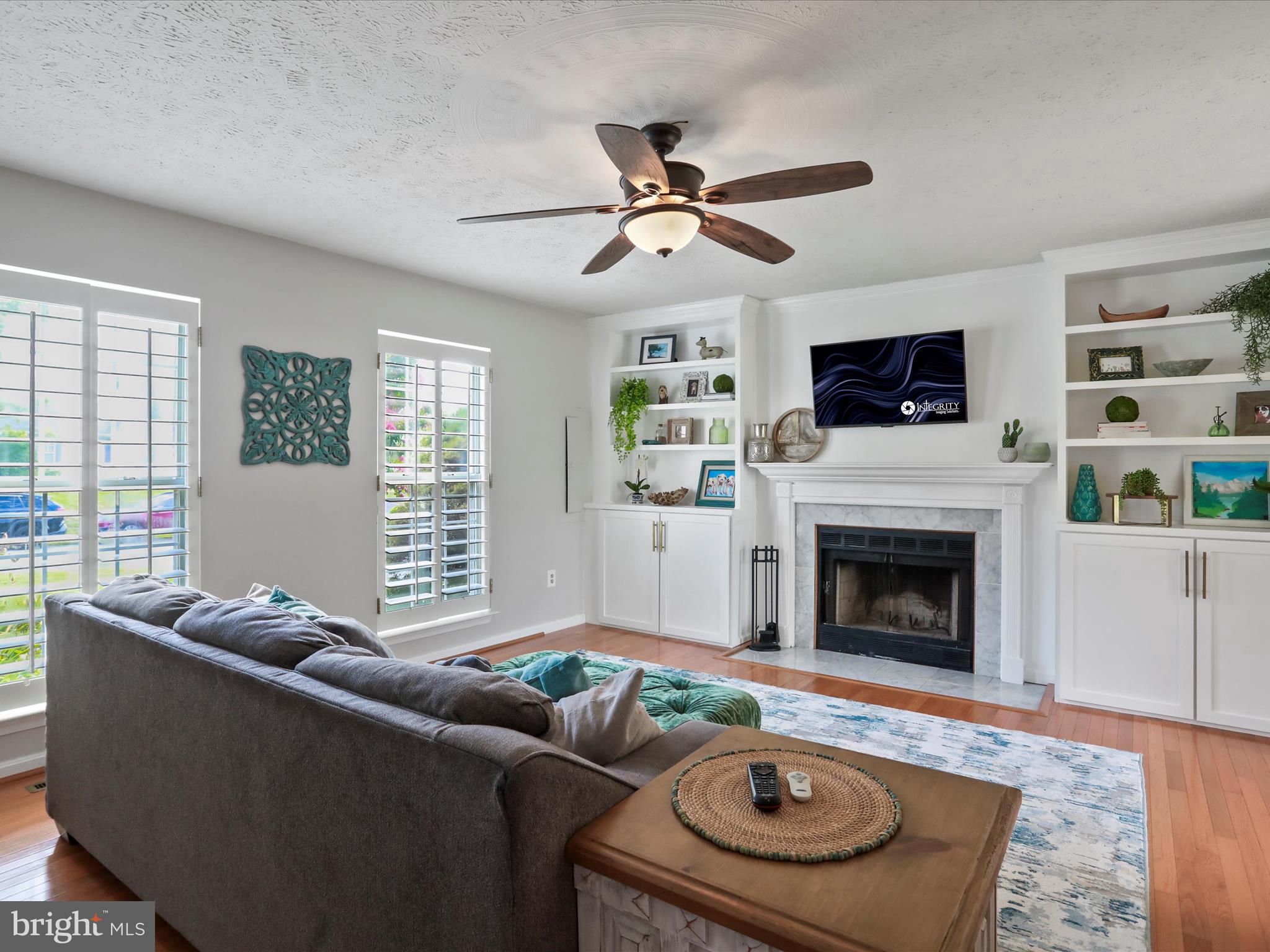 100 Lloyds Road Winchester, VA 22602 - Photo 6 of 39 a living room with furniture and a fireplace
