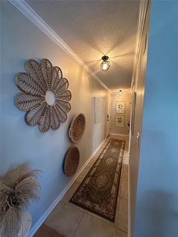 a bathroom with a granite countertop sink a mirror and shower