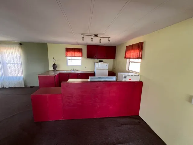a bathroom with a sink a toilet and tub