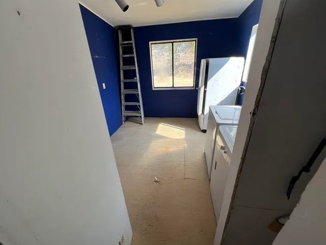 a view of water yard with a tree