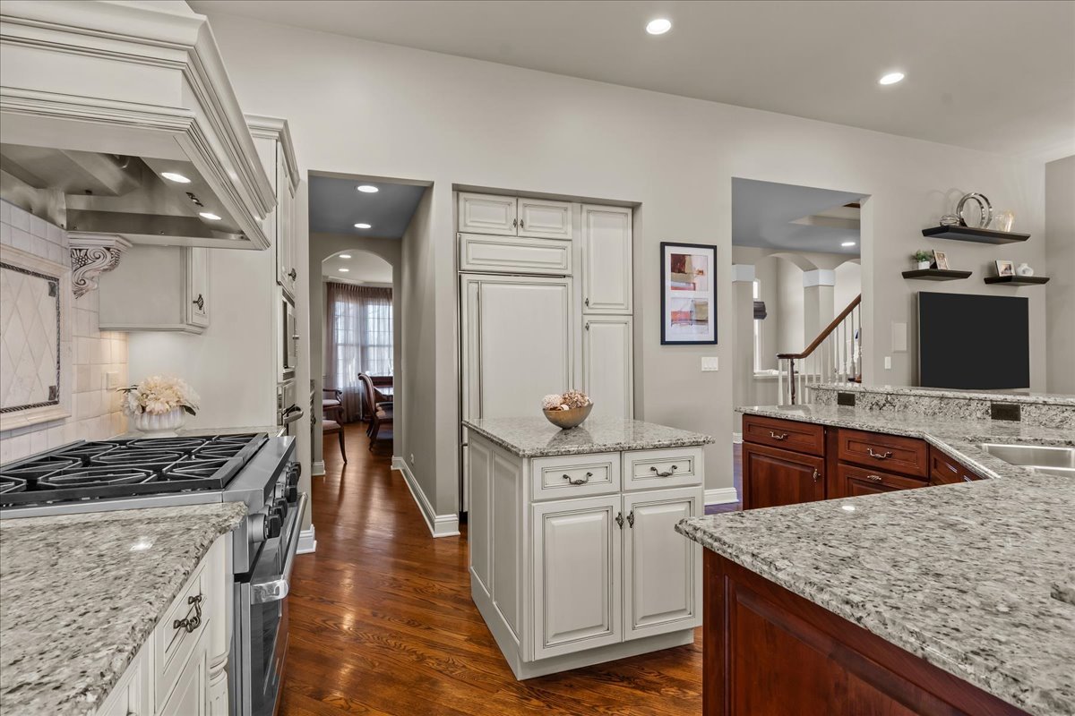 891 Carroll Road Lake Forest, IL 60045 - Photo 11 of 39 a kitchen with stainless steel appliances granite countertop a stove and a sink