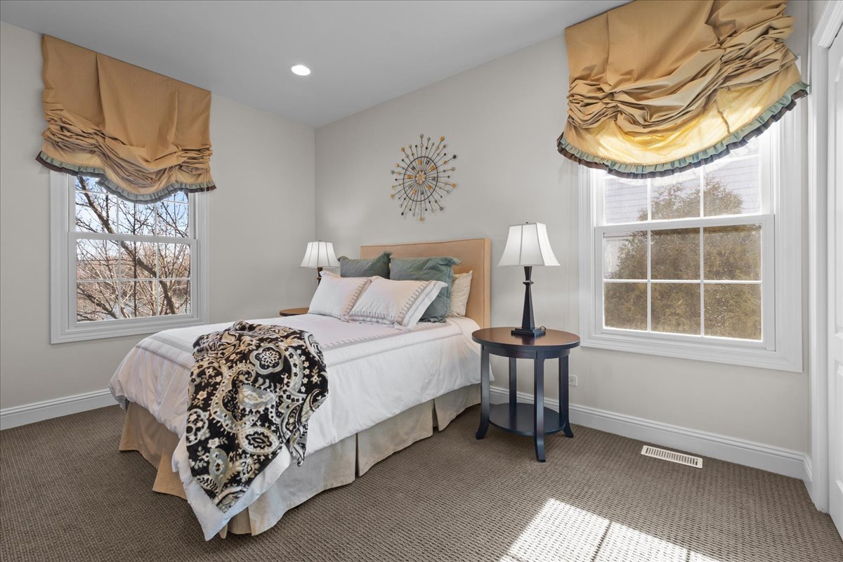 891 Carroll Road Lake Forest, IL 60045 - Photo 26 of 39 a bedroom with a bed and a window