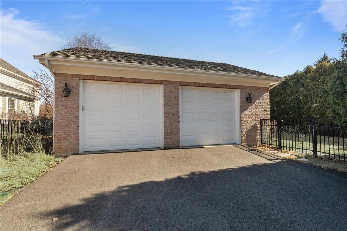 891 Carroll Road Lake Forest, IL 60045 - Photo 34 of 39 a front view of a house with a garage