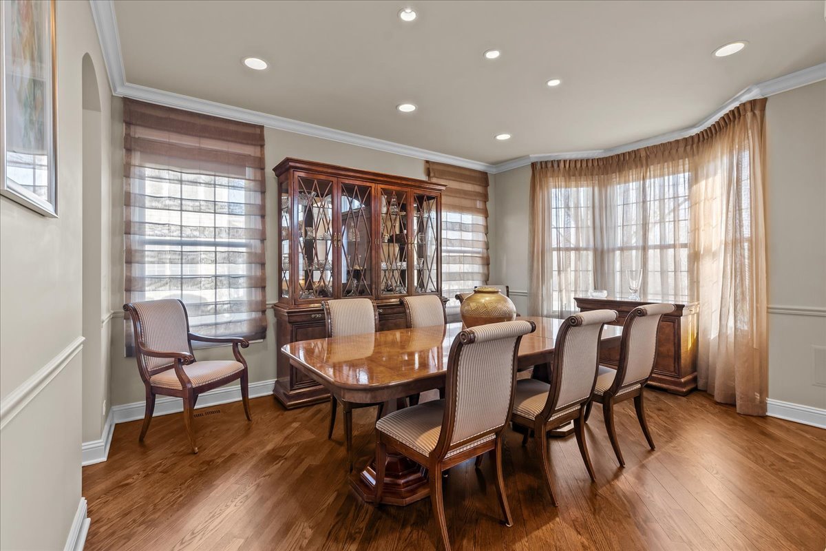 891 Carroll Road Lake Forest, IL 60045 - Photo 6 of 39 a view of a a dining room with furniture window and wooden floor