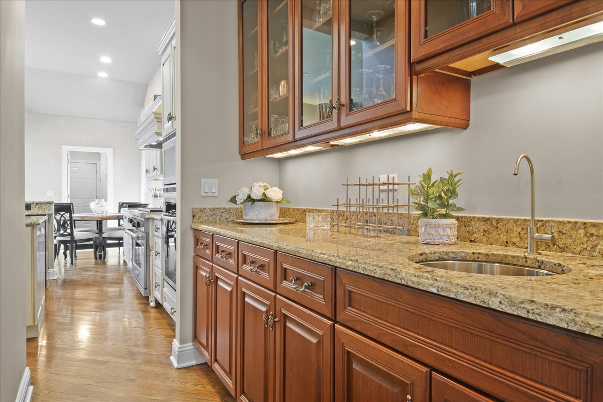 891 Carroll Road Lake Forest, IL 60045 - Photo 8 of 39 a kitchen with stainless steel appliances granite countertop a lot of counter space and cabinets
