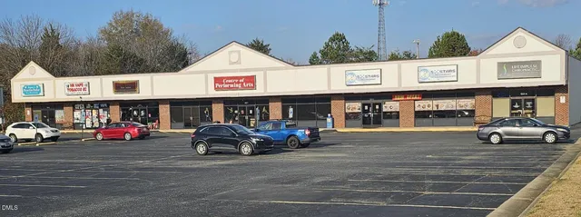 a car parked in front of a store
