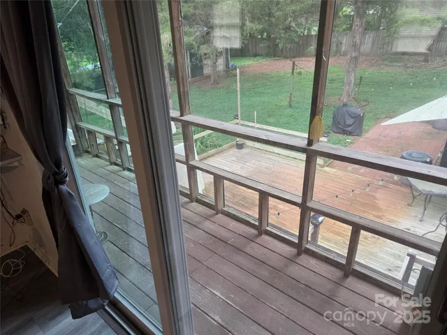 a view of a bench in the backyard