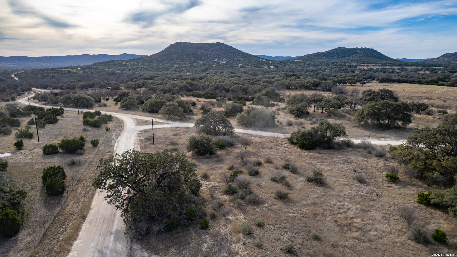 0 Little Dry Frio Road Leakey, TX 78873 - Photo 6 of 12 a view of a town with mountains in the background