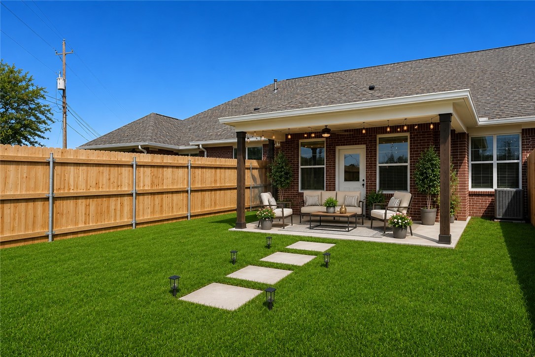 2012 Reagan Court Bryan, TX 77802 - Photo 19 of 19 a view of a house with backyard porch and sitting area