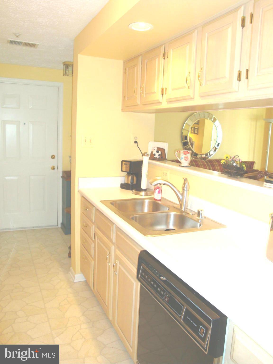 37 Laurel Path Court, Unit 37 Baltimore, MD 21236 - Photo 11 of 22 a kitchen with stainless steel appliances granite countertop a sink and a stove