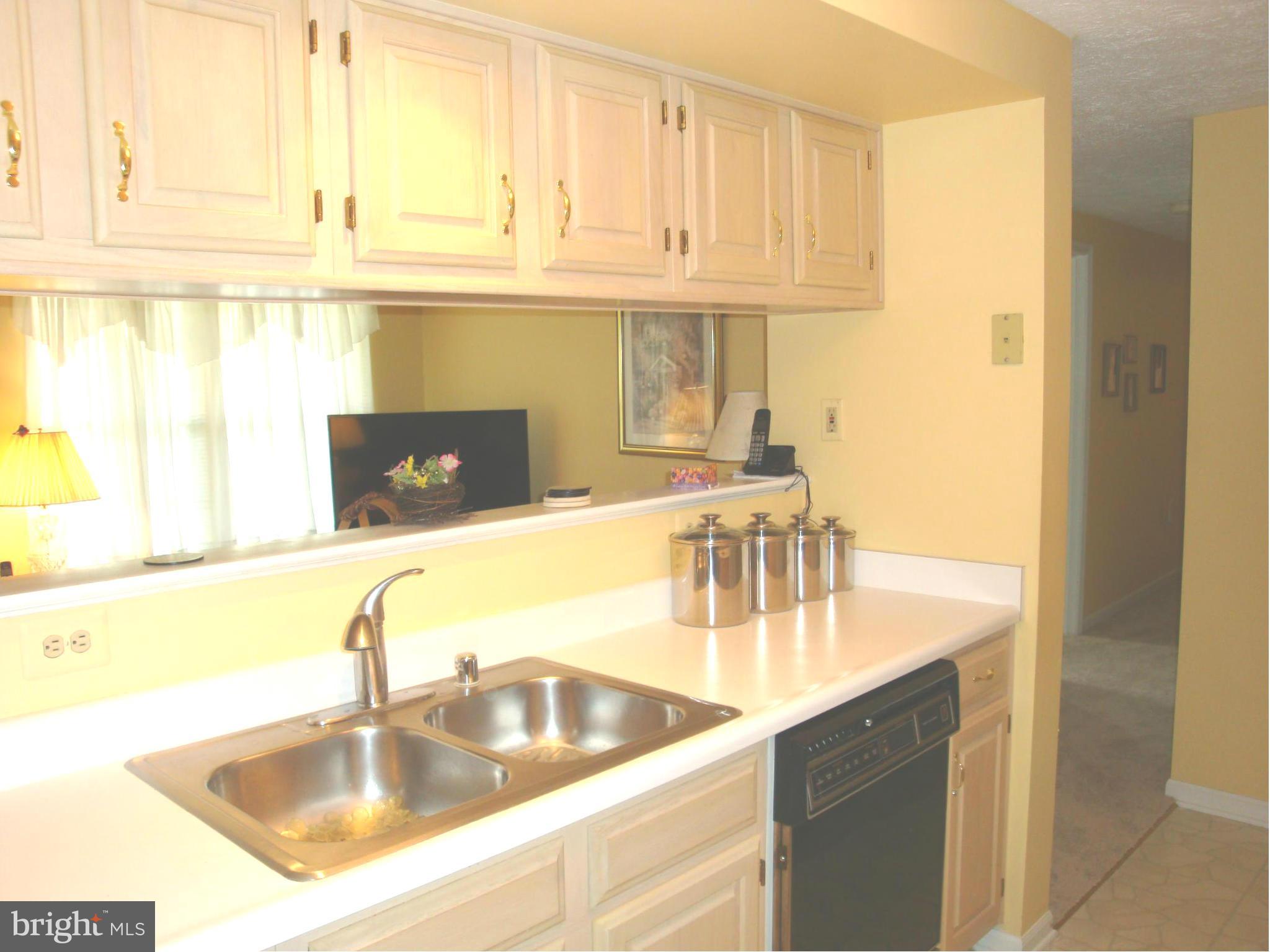 37 Laurel Path Court, Unit 37 Baltimore, MD 21236 - Photo 13 of 22 a kitchen with stainless steel appliances granite countertop a sink and a window