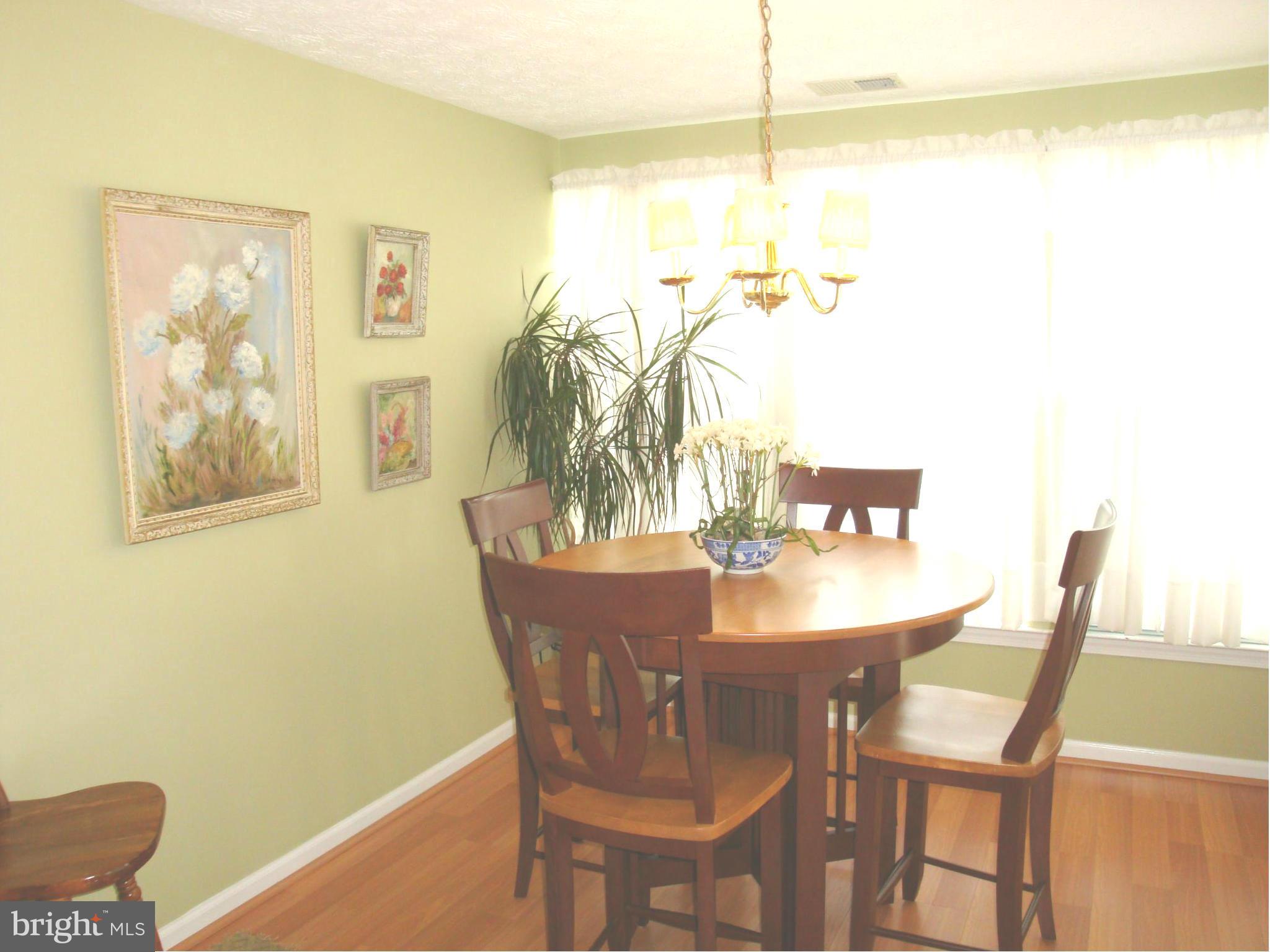 37 Laurel Path Court, Unit 37 Baltimore, MD 21236 - Photo 4 of 22 a dining room with furniture and window