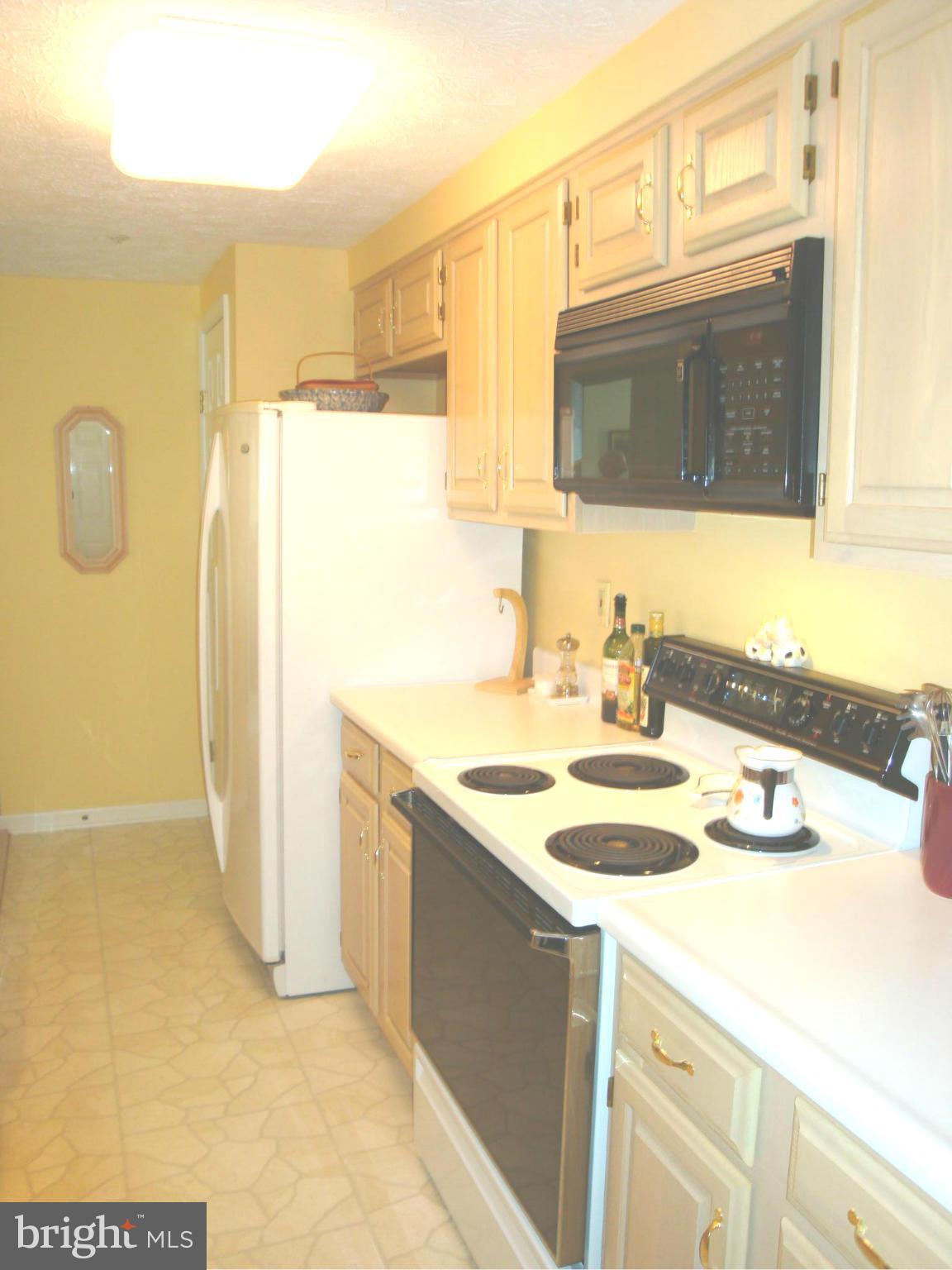 37 Laurel Path Court, Unit 37 Baltimore, MD 21236 - Photo 9 of 22 a bathroom with a sink and a mirror