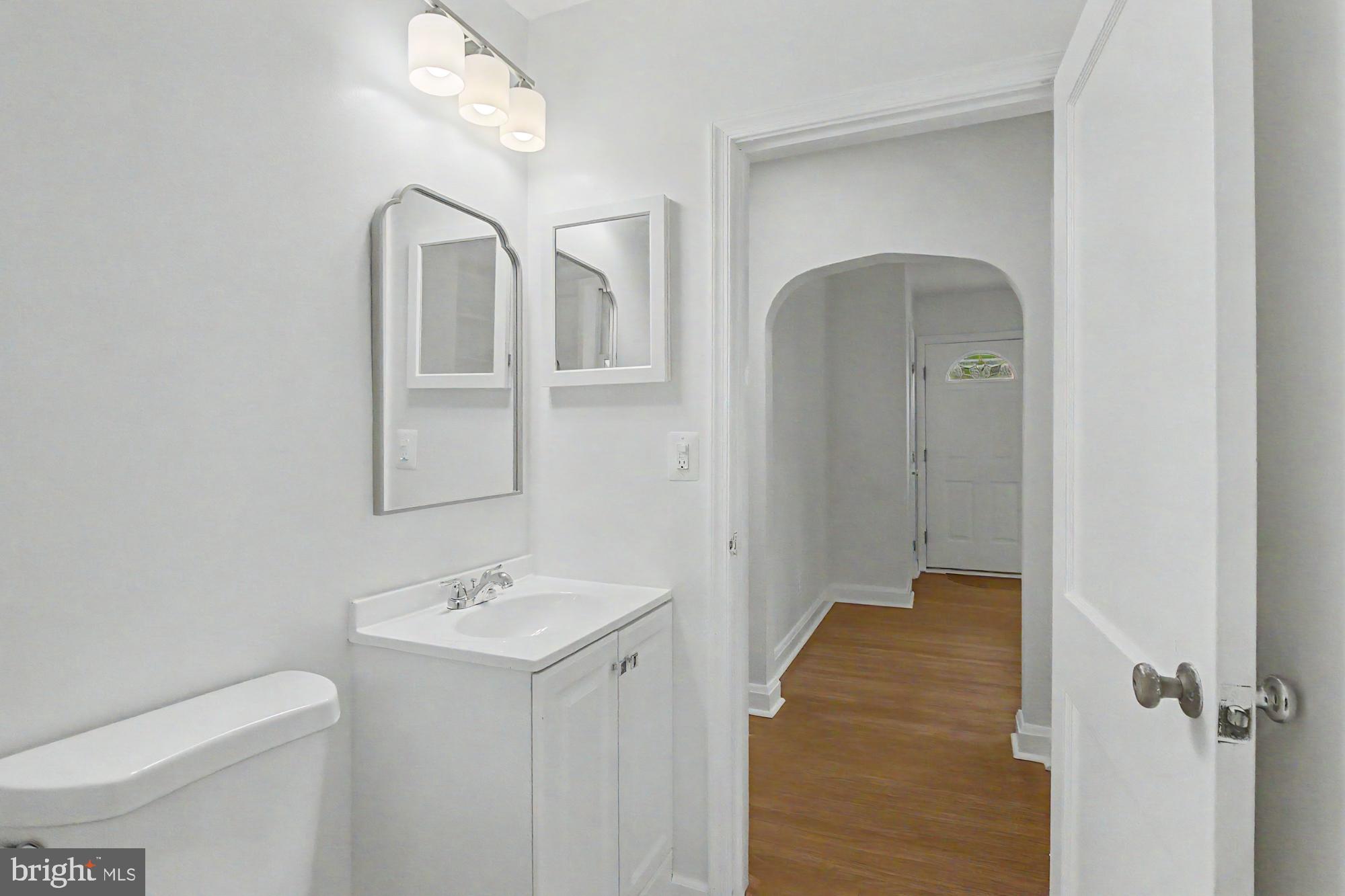 604 Prospect Mill Road Bel Air, MD 21015 - Photo 20 of 36 a bathroom with a sink a toilet and shower