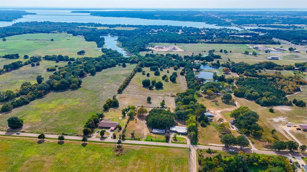 205 Peach Tree Road Mabank, TX 75156 - Photo 40 of 40 an aerial view of residential houses with outdoor space