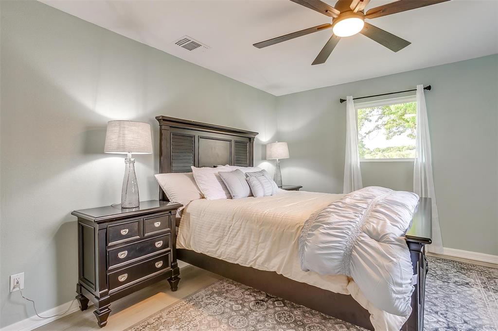 520 Deer Trail Gordon, TX 76453 - Photo 28 of 40 Bedroom featuring baseboards and ceiling fan
