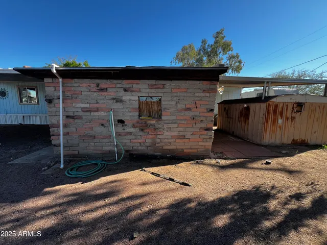 a bathroom with a tub and shower