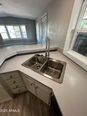 a view of entryway with wooden floor