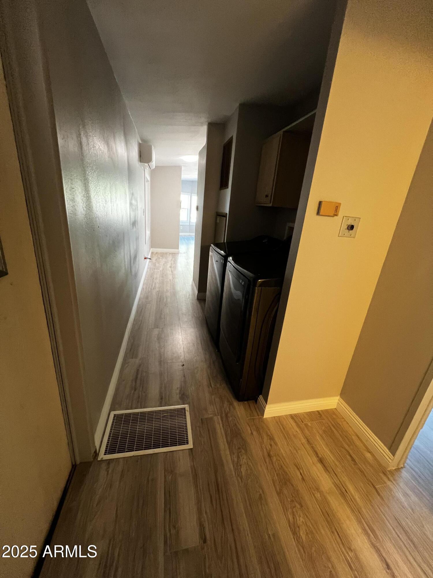 11201 East Jupiter Drive Apache Junction, AZ 85120 - Photo 19 of 35 a view of entryway with wooden floor