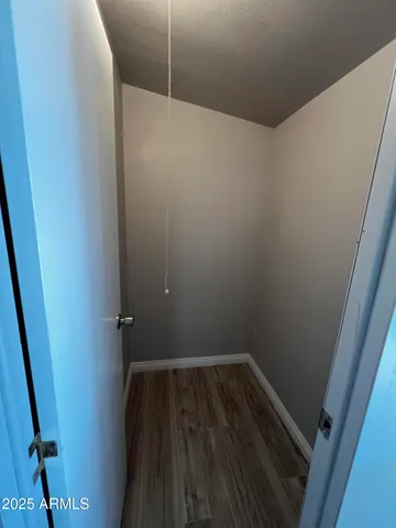 a bathroom with a tub and shower