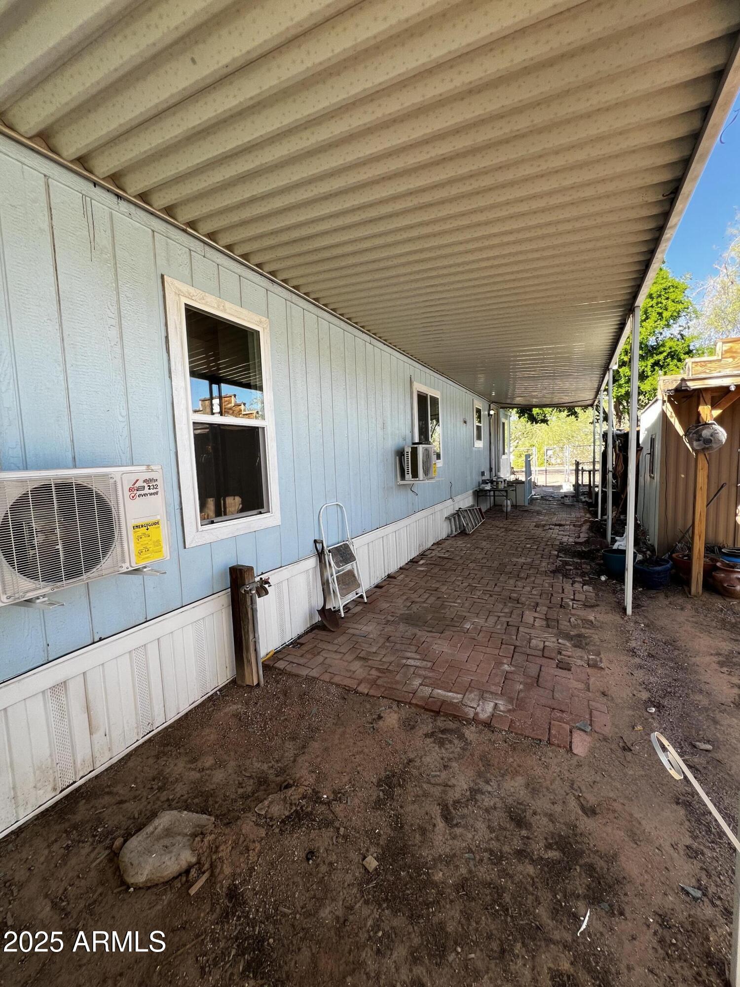 11201 East Jupiter Drive Apache Junction, AZ 85120 - Photo 4 of 35 a view of an outdoor space and a window