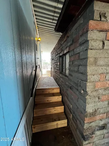 a view of a porch with furniture