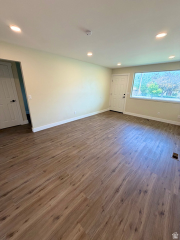 450 13800 South, Unit 2 Draper, UT 84020 - Photo 3 of 21 Spacious room featuring wood-finish flooring, recessed lighting, and light-toned walls
