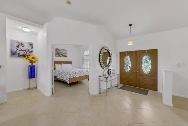 a view of room with furniture and window