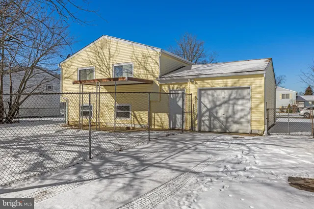 a street view covered with snow