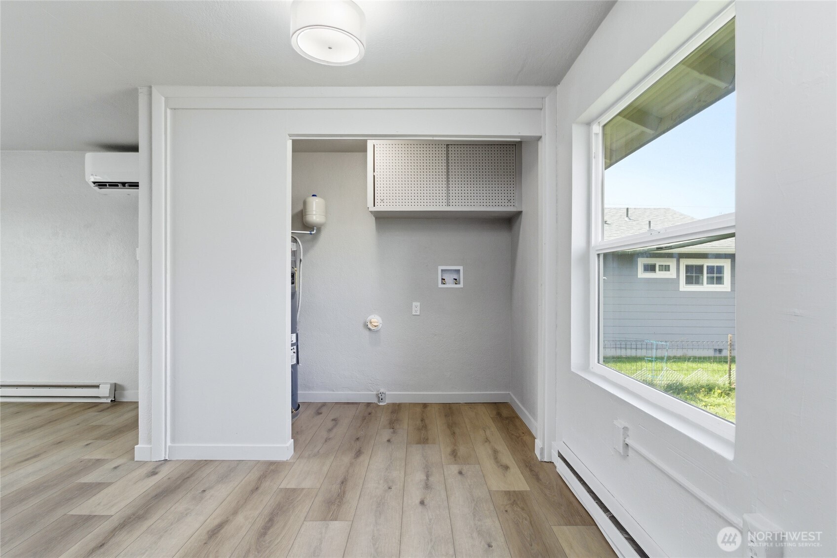 552 Edith Avenue Walla Walla, WA 99362 - Photo 16 of 19 wooden floor in an empty room with a window
