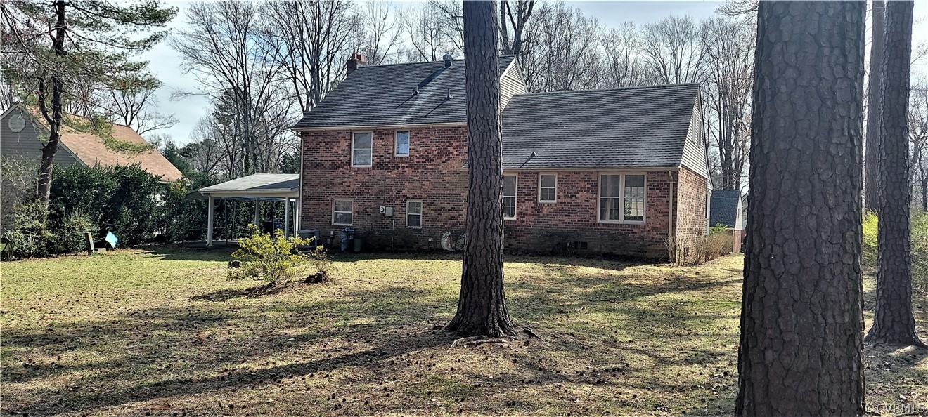 408 Whitaker Road Richmond, VA 23235 - Photo 23 of 39 View of the brick home and rear yard