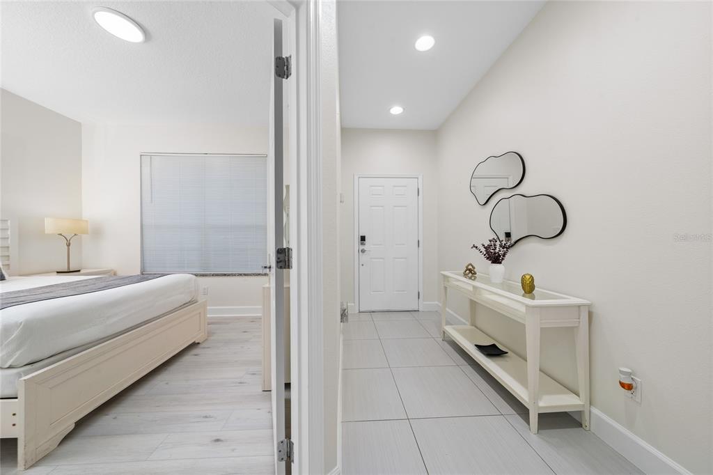 17417 Placidity Avenue Clermont, FL 34714 - Photo 16 of 25 a bathroom with a sink and mirror